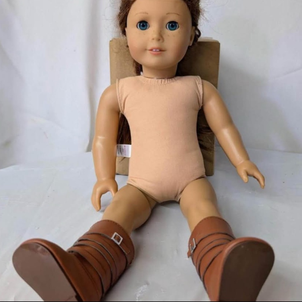 Doll with Brown Boots and Blue Eyes